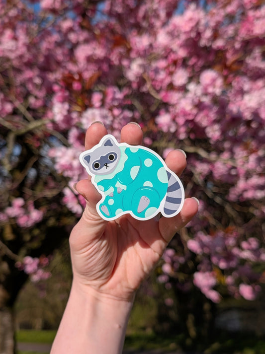 Raccoon Wearing a clown outfit sticker
